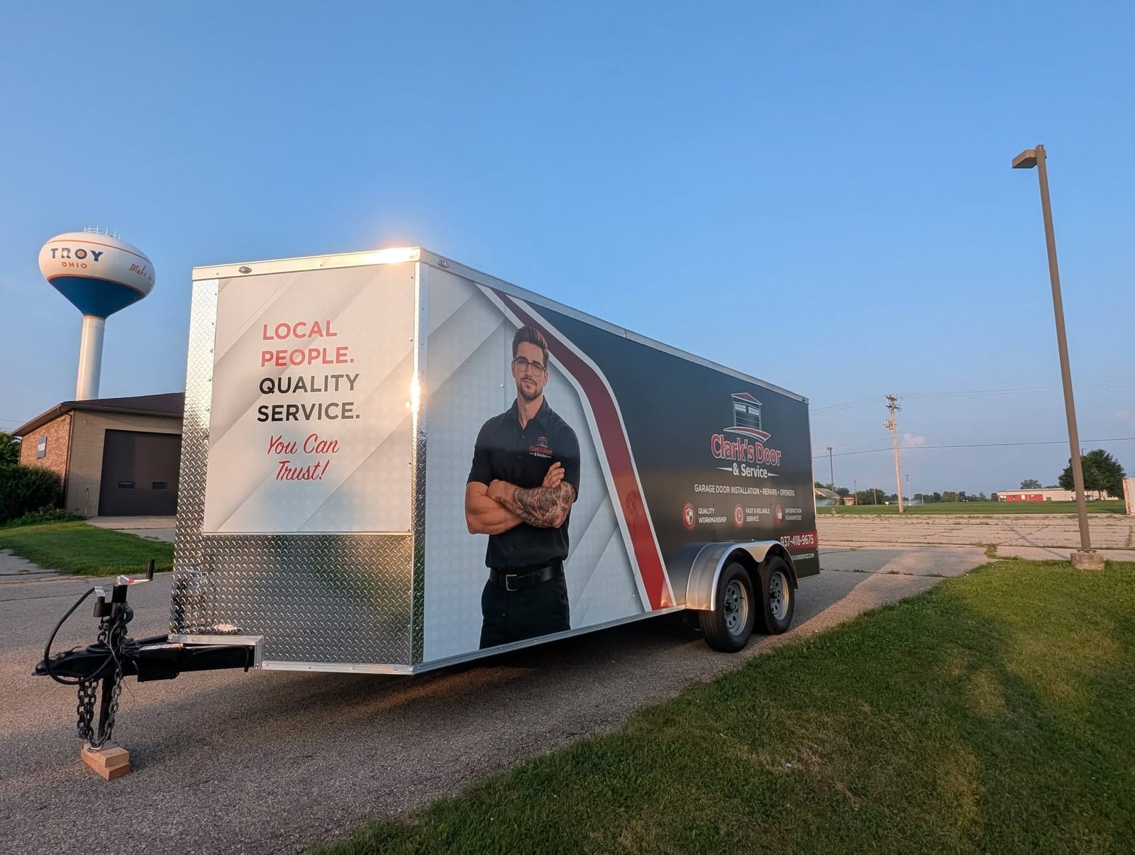 Clark’s Door & Service trailer near the Troy water tower